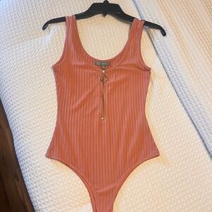 Good Luck Gem Ribbed Coral-Pink Tank One-Piece with zipper.